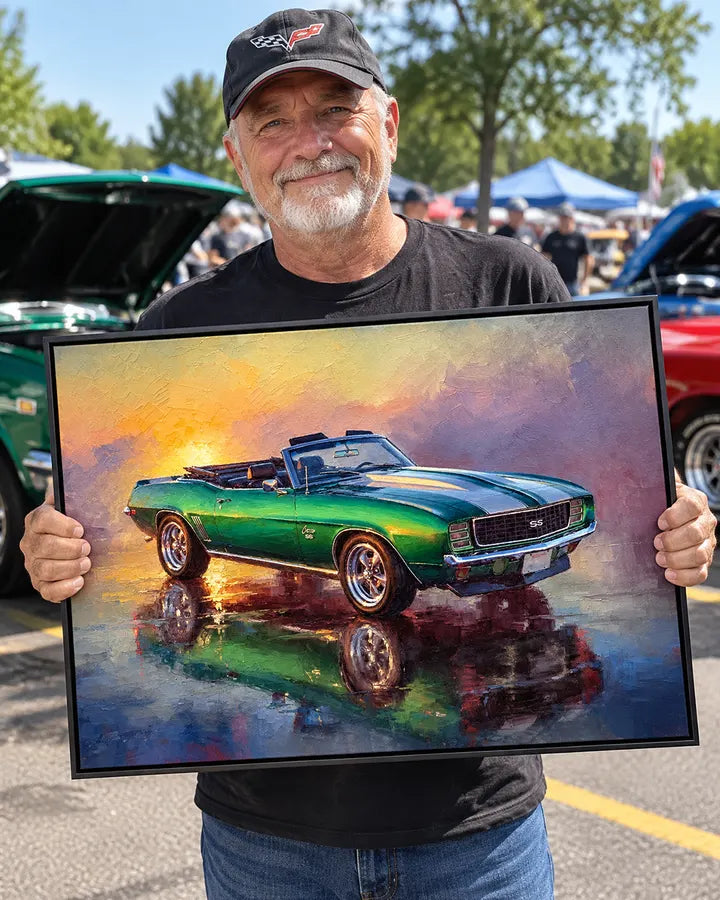 Customer holding his framed Camaro convertible artwork